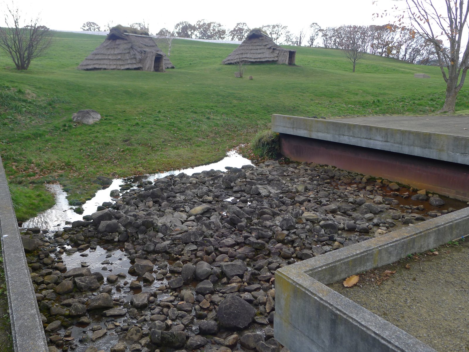 Reconstructed pit dwellings at Kitakogane Shell Midden Park