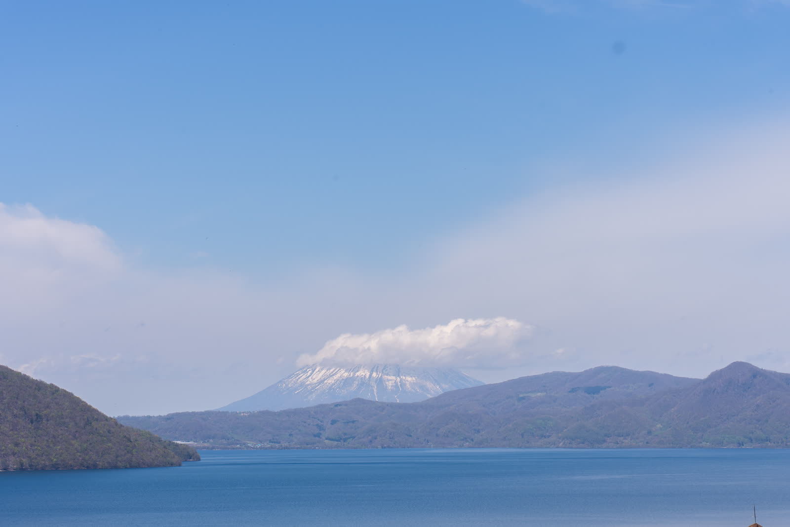 Lake Toya and a snow-capped Mount Yotei seen from Sobetsu Park